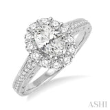 1 1/6 Ctw Diamond Engagement Ring with 5/8 Ct Oval Cut Center Stone in 14K White Gold