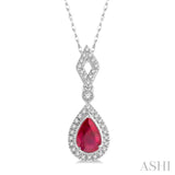 1/6 Ctw Pear Shape 6x4 MM Ruby & Round Cut Diamond Precious Pendant With Chain in 10K White Gold