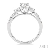 7/8 Ctw Pear and Round Cut Diamond Engagement Ring With 1/2 Ct Round Cut Center Stone in 14K White Gold