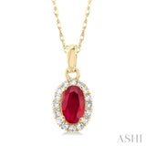 5x3 MM Oval Shape Ruby and 1/20 Ctw Single Cut Diamond Halo Precious Pendant with Chain in 10K Yellow Gold