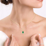 5x3 MM Pear Shape Emerald and 1/20 Ctw Single Cut Diamond Halo Precious Pendant with Chain in 10K Yellow Gold