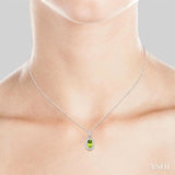 5x3 MM Oval Shape Peridot and 1/20 Ctw Single Cut Diamond Halo Semi-Precious Pendant with Chain in 10K White Gold