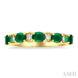 4x3 MM East-West Set Oval Cut Emerald and 1/20 Ctw Round Cut Diamond Precious Band in 14K Yellow Gold