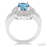 9x7 MM Oval Cut Blue Topaz and 1/50 Ctw Round Cut Diamond Ring in Sterling Silver