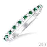 1.35 MM Round Cut Emerald and 1/10 Ctw Petite Round Cut Diamond Precious Stack Band in 10K White Gold