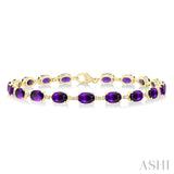 6X4 MM Oval Cut Amethyst and 1/6 Ctw Round Cut Diamond Semi-Precious Tennis Bracelet in 10K Yellow Gold