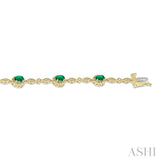 5x3 MM Oval Cut Emerald and 1/20 Ctw Round Cut Diamond Bracelet in 10K Yellow Gold