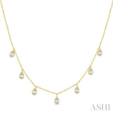 1/3 Ctw Pear Shaped Danglers Fusion Baguette and Round Cut Diamond Station Necklace in 10K Yellow Gold